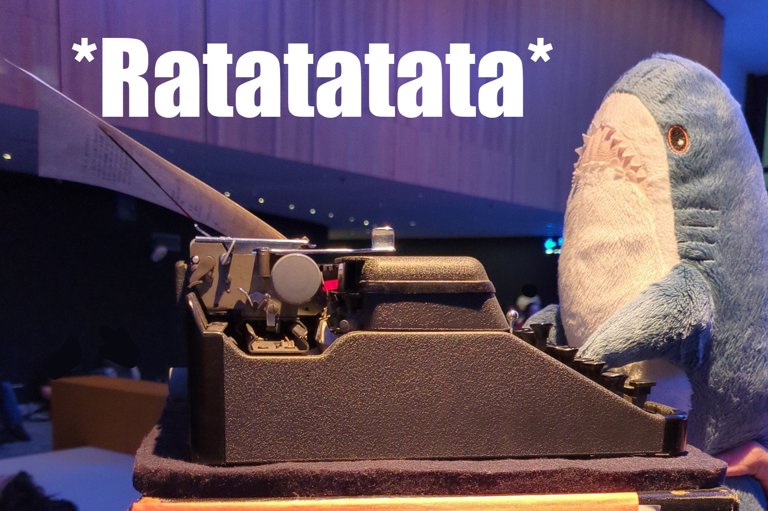 proj/86e404f2-278a-49ed-b1da-aa39c99eca54/banner/blahaj_typewriter_banner_ratata.jpg